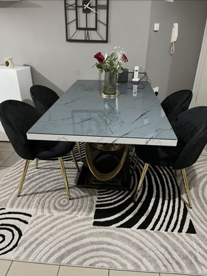 Dining table with smoked glass and 4 chairs like new