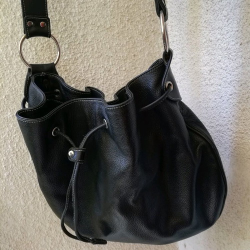 Leather shoulder bag like a pouch in like new condition, black