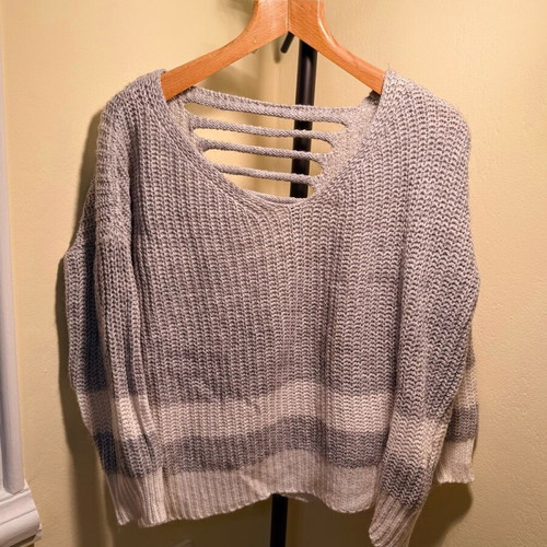 Knitted grey and white sweater with back design, like new