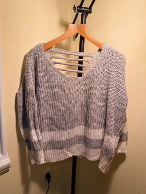 Knitted grey and white sweater with back design, like new