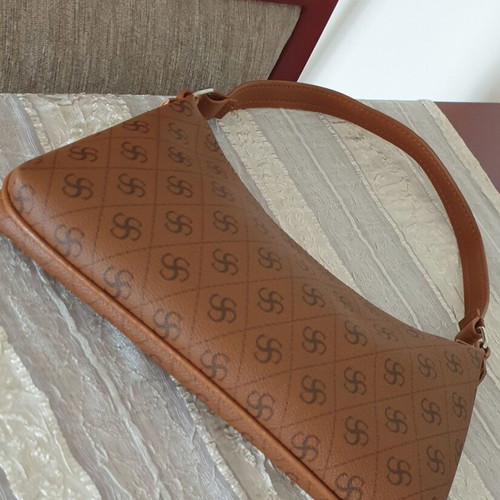 Brown shoulder bag with unique pattern like new