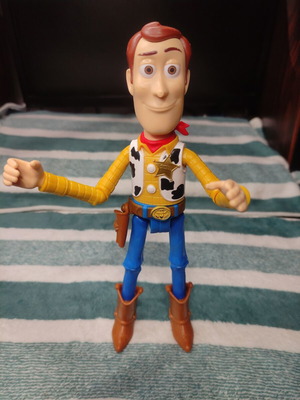 Woody action figure from Toy Story 23cm used, missing hat and nose damage