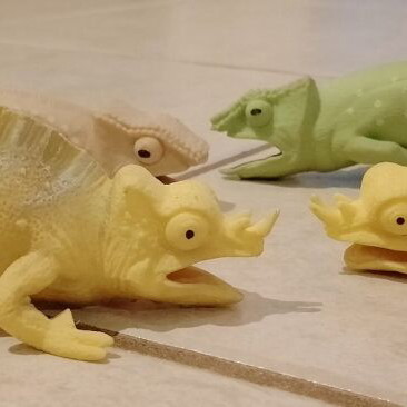 Rubber toys set of 4 used, chameleons and reptiles