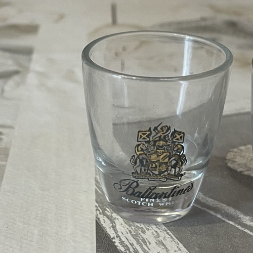 Whiskey Shot Glasses set of 4 like new, collectible labels