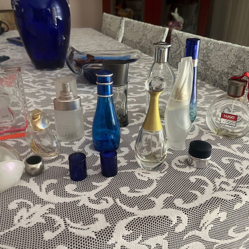 Empty bottles of famous perfumes like new for collection