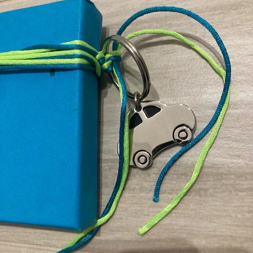 Gift box new with ribbon and car keychain