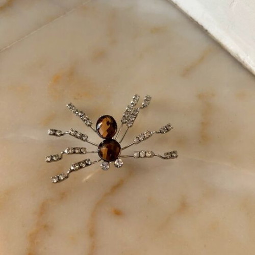 Spider brooch like new with rhinestones and gold crystals