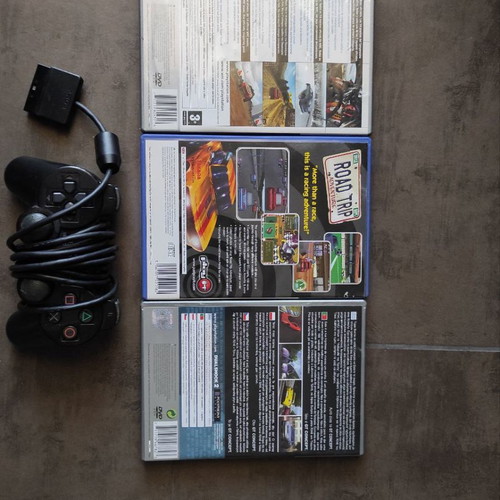 PlayStation 2 console used with controller, Hurricane wheel and 3 games