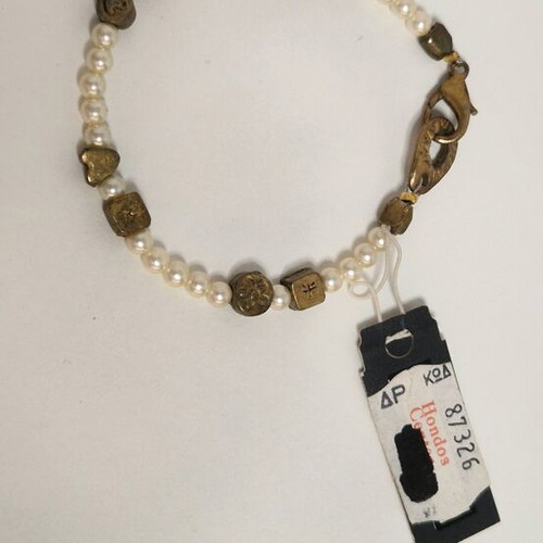 Bracelet old and unused with metal elements