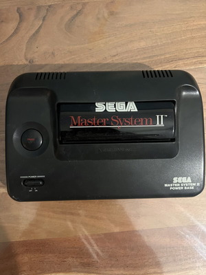 Sega Master System II console used, missing cables, includes game