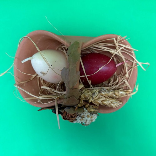 Clay basket with two wax eggs used, vintage