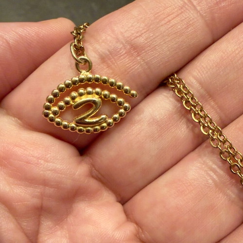 Kessaris 2026 charm pendant sterling silver 925 like new, gold tone
