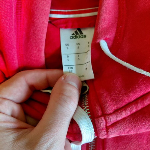 Manchester United jacket authentic used with small chlorine stain