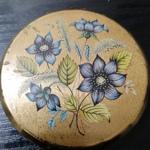 Vintage powder compact used gold plated with 1970 flowers