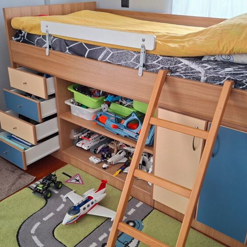 Children's loft bed with ladder and storage used