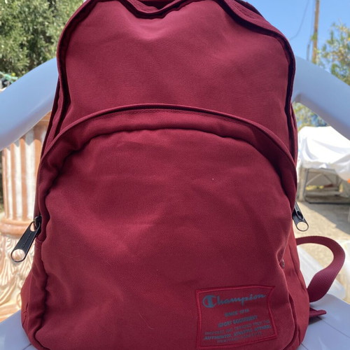 Champion backpack red, like new, large capacity with multiple compartments
