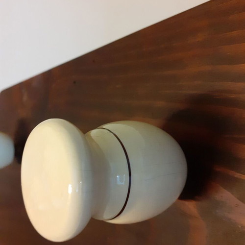 Wooden wall hanger with handles from old barber shaving brushes
