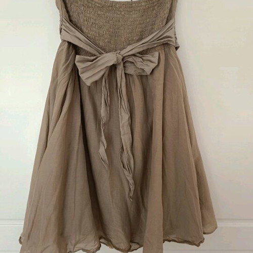 Iso strapless dress like new, beige with silk belt and beehive back