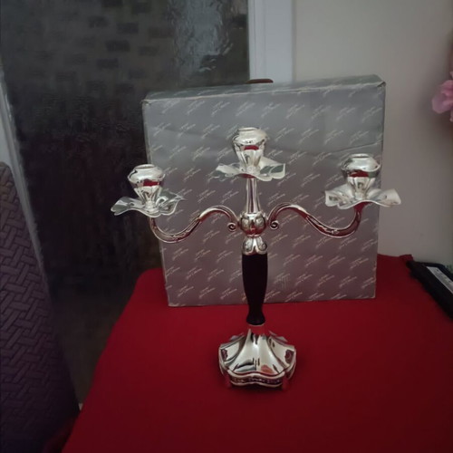Metal candlestick silver color new with box