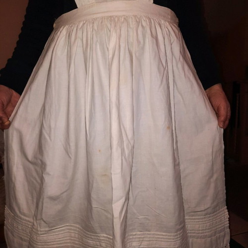 Traditional white kitchen apron with shoulders, buttons at back