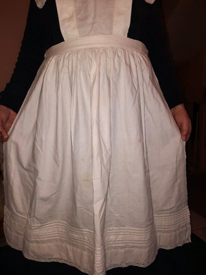Traditional white kitchen apron with shoulders, buttons at back