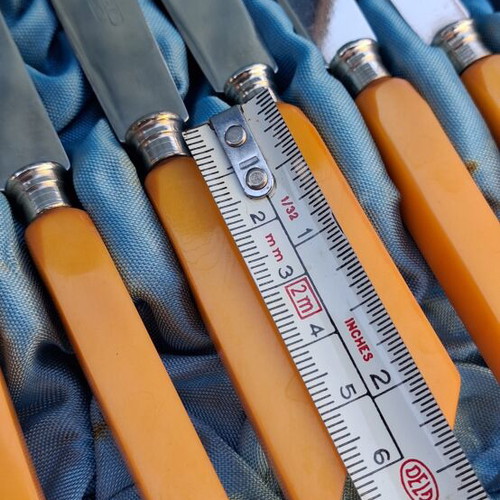 Old set of Vangelis mastic knives, missing one fork