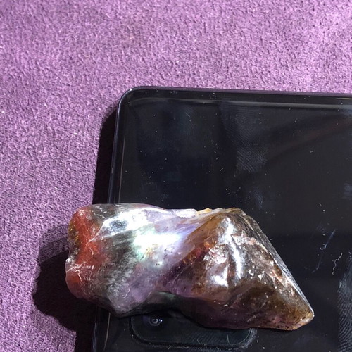 Auralite 23 natural authentic stone with colorful patterns