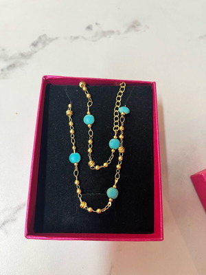Gold necklace with blue stones made of steel new