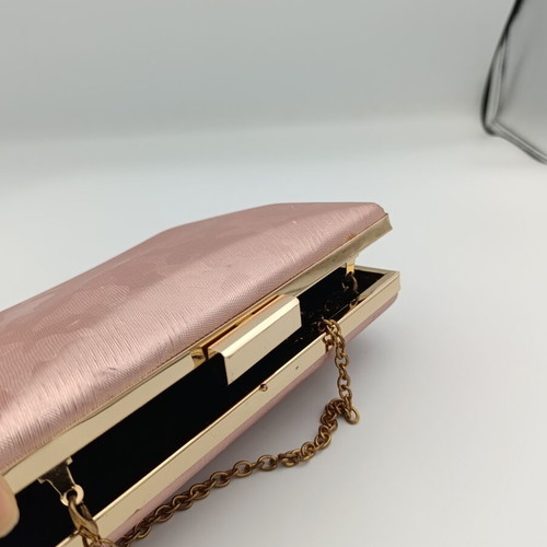 Baby Pink Clutch Bag used with embossed print and gold chain strap