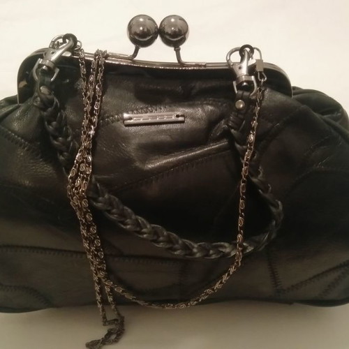 Custo black leather handbag used with straps