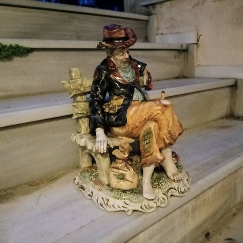 Italian porcelain vintage figure of old man with wine jug and pipe used