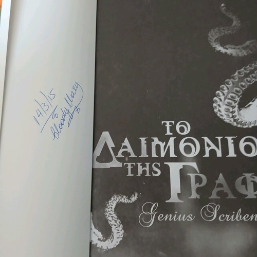 To Daimonio Tis Grafis book used, in very good condition