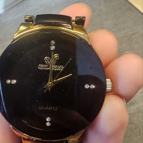 Modern quartz wristwatch new, black, unisex