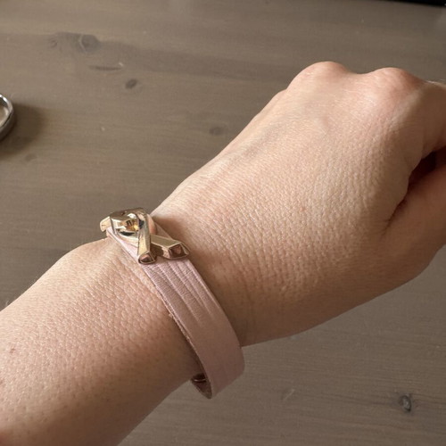 Bracelet designed by Doukas Chatzidoukas for Estée Lauder, like new, breast cancer prevention