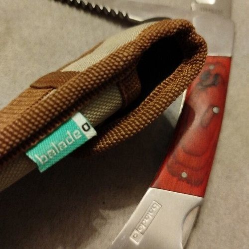 Pocket knife with blade, saw and opener like new