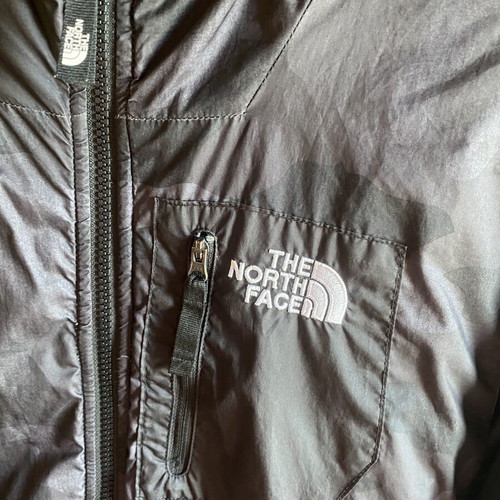 The North Face jacket used, reversible, size S, black and gray