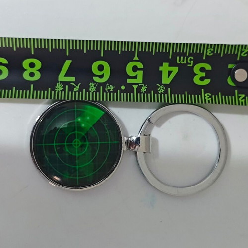 Metal keychain like new with green radar screen design