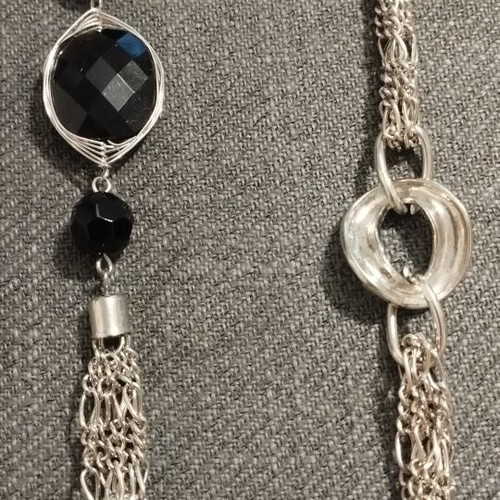 Long women's necklace with large black stones and silver chains like new