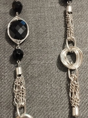 Long women's necklace with large black stones and silver chains like new