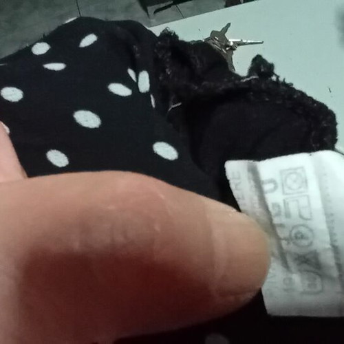 Black Short Skirt with White Polka Dot Pattern and Bow Tie, Like New
