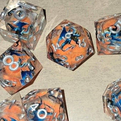 Liquid core D&D dice set with blue dragon design