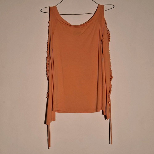 Orange shirt like new with knitted holes on sleeve