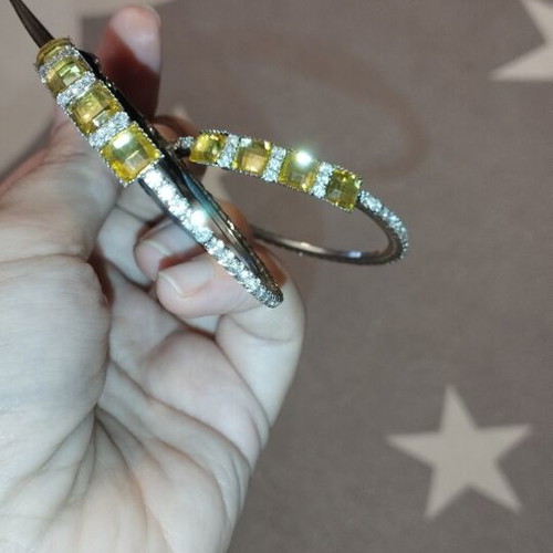 Ro Ro Accessories hoop earrings with yellow and clear stones