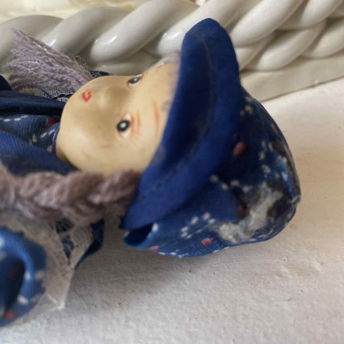 Vintage ceramic collectible doll with cloth limbs