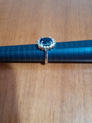 Ring with blue stone like new, silver color