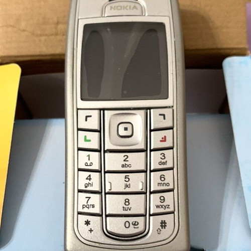 Nokia 6230i new with original screen protectors silver