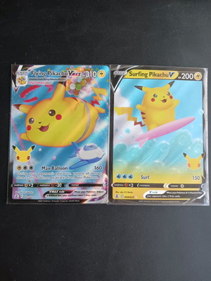 Flying Pikachu VMAX and Surfing Pikachu V cards new