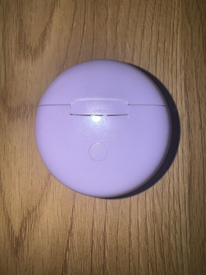 JMMO Bluetooth earbuds used with charging case