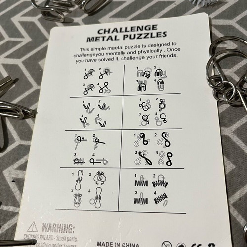 Challenge metal puzzles board game like new