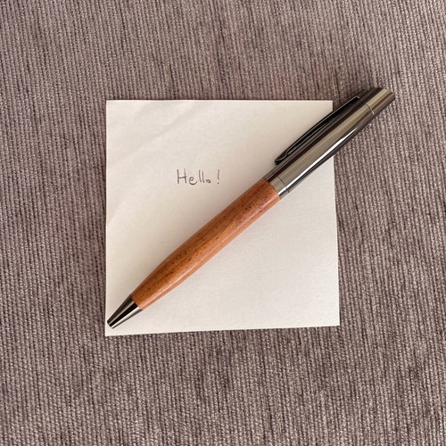 Pen new with black ink and spare blue ink refill